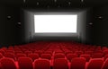 Cinema auditorium with red seats and white blank screen Royalty Free Stock Photo