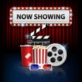 Cinema background concept, movie theater object on red curtain background and now showing with electric bulbs frame