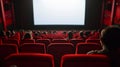 Cinema blank screen and people in red chairs in the cinema hall. Generative Ai