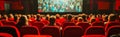 Cinema blank screen and people in red chairs in the cinema hall. Blurred People silhouettes watching movie performance