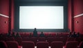 Cinema blank wide screen and people in red chairs in the cinema hall