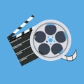 Cinema clap and film reel Royalty Free Stock Photo