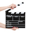 Cinema clapboard in female hands