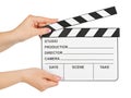 Cinema clapboard in hands