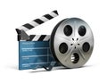 Cinema clapper and film tape Royalty Free Stock Photo