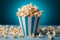 Cinema classic Blue popcorn box, a tasty treat on white