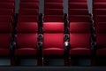 Cinema Cozy Armchairs With Comfortable Elbows. Illuminated armchair in the center.3d Rendering.