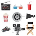 Clapper board, megaphone, movie tickets, director chair, soda cup, popcorn, reel, retro projector Royalty Free Stock Photo