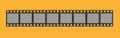 Cinema filmstrip roll on white background. Blank negative film. Royalty Free Stock Photo