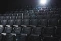Cinema hall with rows of grey