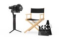 Cinema Industry Concept. DSLR or Video Camera Gimbal Stabilization Tripod System near Director Chair, Movie Clapper and Megaphone
