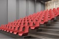 Cinema interior corner, red chairs, gray