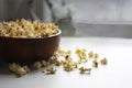 popcorn in a dish on the table