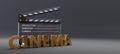 CINEMA and Movie clapper. Film scene clapperboard and golden text on gray background. 3d render