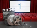 Cinema, movie or home video concept background. Film reels and c Royalty Free Stock Photo