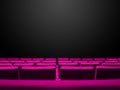 Cinema movie theatre with pink seats rows and a black background