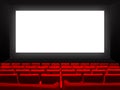 Cinema movie theatre with red seats and a blank white screen Royalty Free Stock Photo