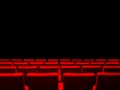 Cinema movie theatre with red seats rows and a black background Royalty Free Stock Photo