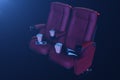 Cinema movie watching. Composition with 3d glasses, popcorn and cup with a drink. Cinema concept wtih blue light. 3D Royalty Free Stock Photo