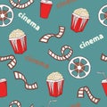Cinema seamless pattern. Bright cinema symbols - popcorn, film reel and strip