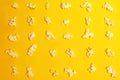 Cinema session, film, popcorn, 3D glasses. View movie concept, discounts. Background of yellow popcorn. Close-up popcorn on a