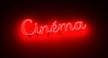 Cinema title in red neon