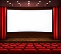 Cinema with white screen, curtain and seats.