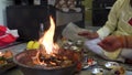 Cinematic footage of Havan or Yagya , a Hindu ritual of offering substances to a holy fire while chanting mantras.Uttarakhand