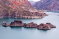 Cinematic lake surrounded by red cliffs in Provincia de Mendoza, Argentina Royalty Free Stock Photo