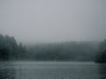 Cinematic moody lake in the myst Royalty Free Stock Photo