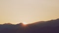 Cinematic Sun Movement. Sunrise Above Mountains. Sunrise Sky Behind Mountains. Beautiful Nature Landscape. Royalty Free Stock Photo