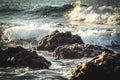 Cinematic View Sea Water Waves On Chunks Of Rocks Of Tropical Beach Village