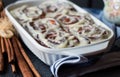 Cinnabon buns with cinnamon and nuts in baking dish