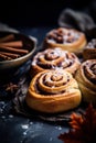 Cinnabon Buns with glaze on wooden background, autumn leaves