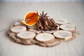 Cinnamon and anise on wooden plate