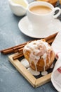 Cinnamon bun with glaze for breakfast