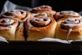 cinnamon bun straight from the oven, with melted frosting and cinnamon swirls