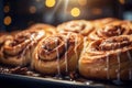 cinnamon buns on a baking sheet