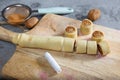 Cinnamon buns - Cinnabon cooking process raw dough. Royalty Free Stock Photo