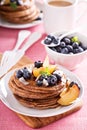 Cinnamon coconut flour pancakes with fresh fruits Royalty Free Stock Photo