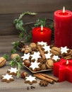 Cinnamon cookies, nuts and spices with christmas decorations Royalty Free Stock Photo