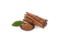 Cinnamon, green leaves,bark and powder isolated on white background.