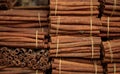 Cinnamon sticks on tied rolls. Canella natural brown aromatic spice background. Royalty Free Stock Photo