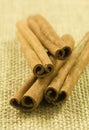 Cinnamon on hessian cloth background