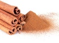 Cinnamon powder and cinnamon sticks Royalty Free Stock Photo