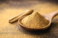 Cinnamon powder, close-up food condiment, spice obtained from arvora bark, used in sweet and savory foods