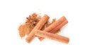 Cinnamon powder, sticks and anise isolated Royalty Free Stock Photo