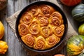 Cinnamon pumpkin dough bun rolls spicy traditional Danish baked vegan sweet autumn cake Royalty Free Stock Photo