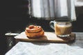 Cinnamon roll with coffe Royalty Free Stock Photo