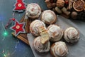 Cinnamon rolls for Christmas. Christmas cakes. Home baking cinnamon rolls for the new year and Christmas holidays. Royalty Free Stock Photo